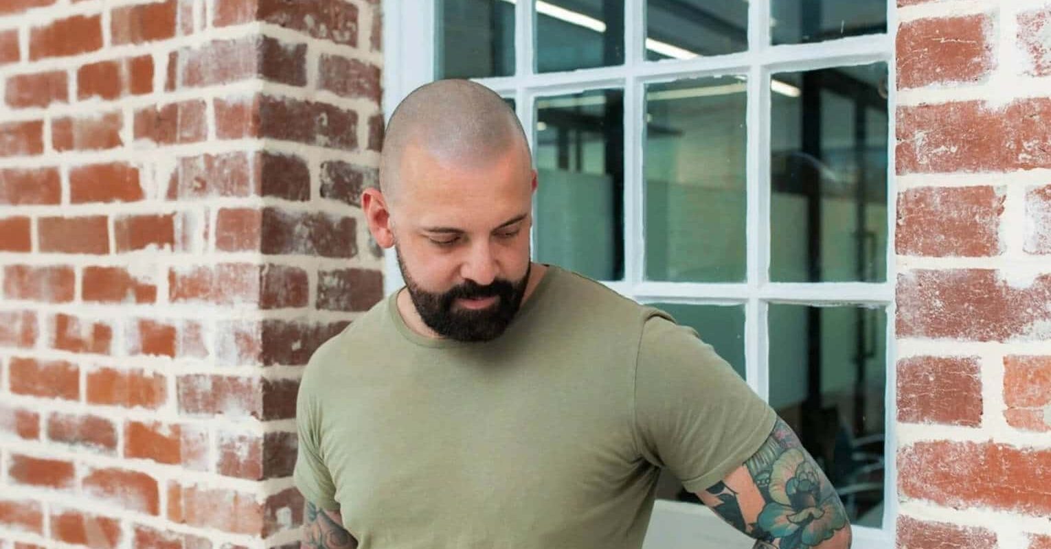 A man with a completed scalp micropigmentation hair tattoo
