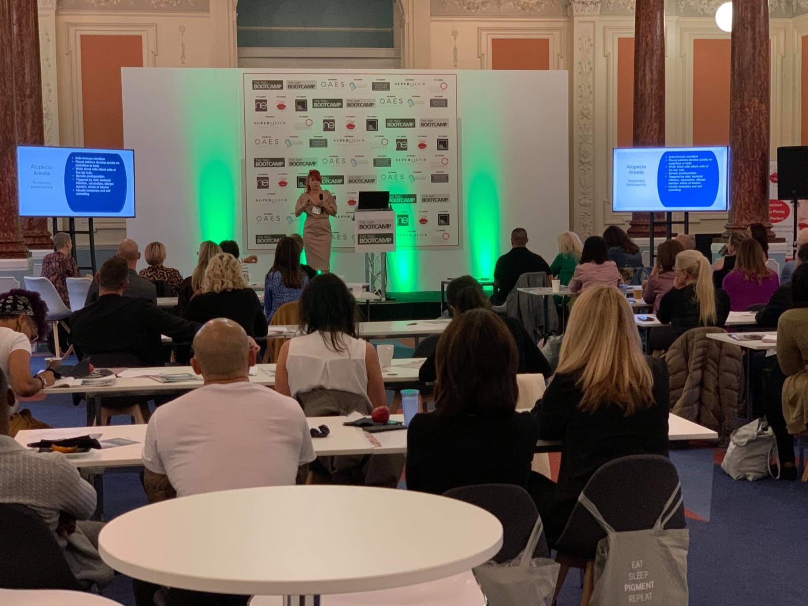 Kate Dawes presenting to a full room at Olympia Beauty, London