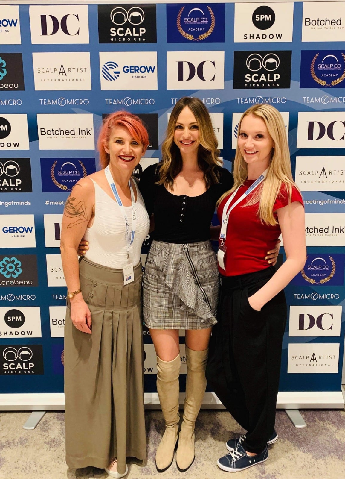 Kelly Dawes (right, in red) with fellow artists at an international SMP conference
