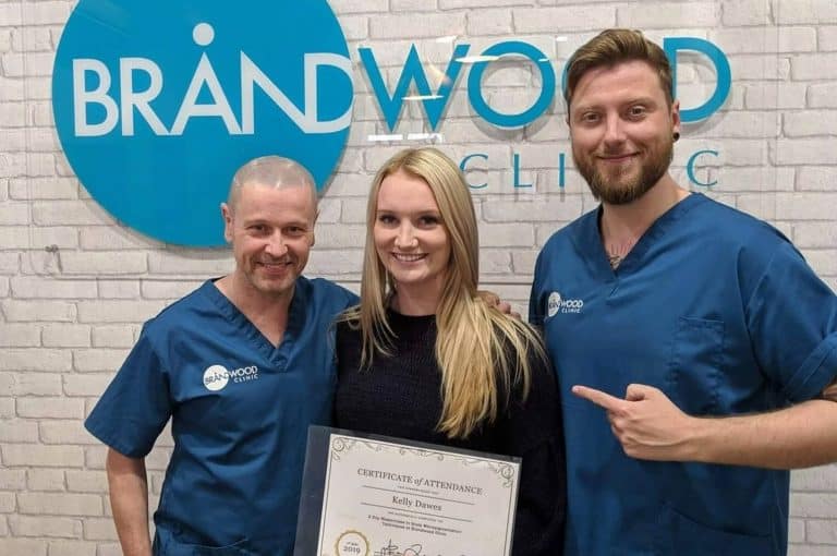 Kelly Dawes with her Certificate of Attendance at Brandwood Clinic, UK, 2019